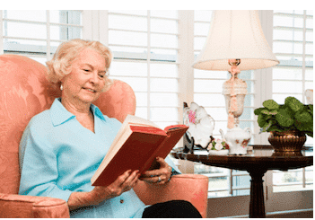 senior woman reading a book