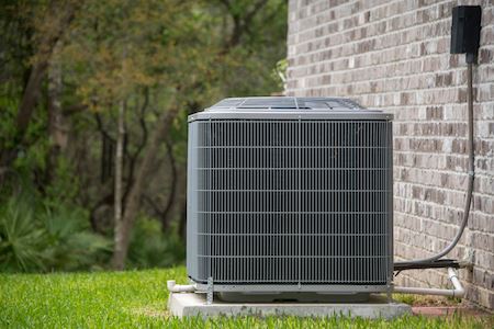 Should You Cover Your Air Conditioner In The Rain and Snow?