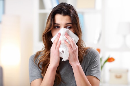 Sneezing When The Air Conditioner Runs? It May Be Making You Sick